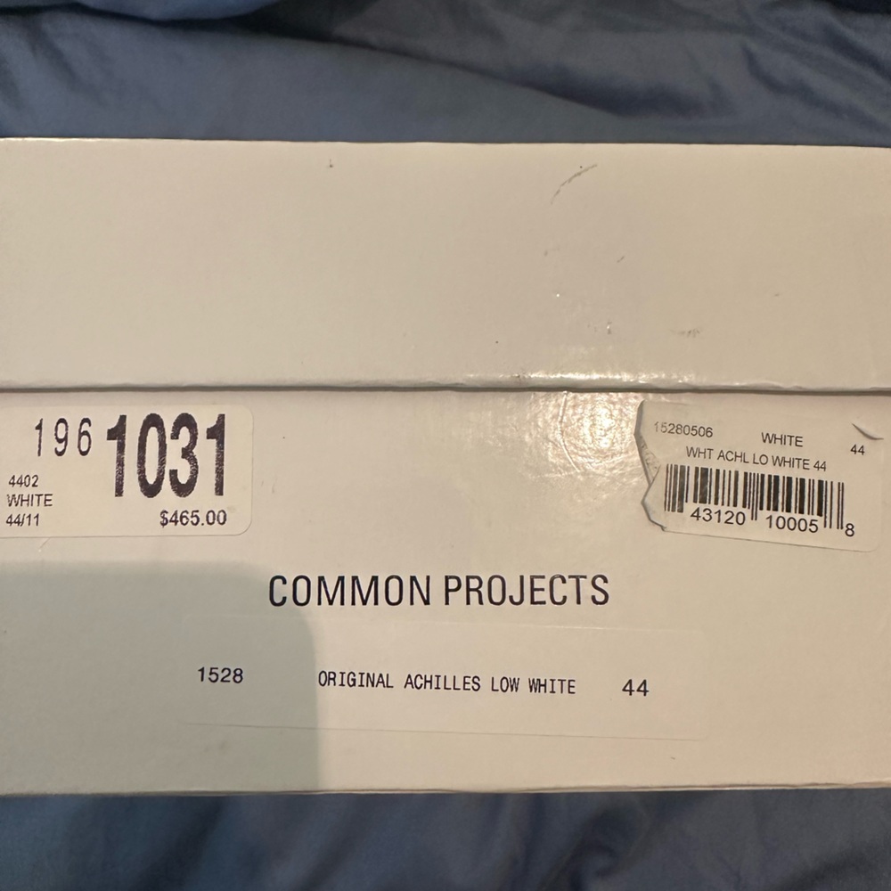 Common Projects men’s low white sneakers